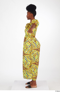 Dina Moses dressed standing t poses whole body yellow long…